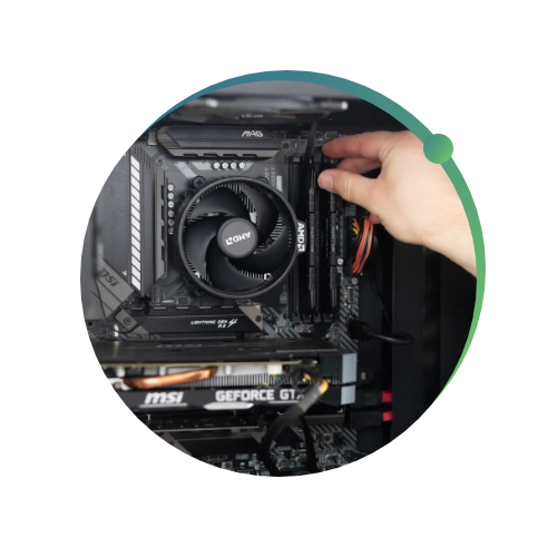 Close up of Conquest Wildman team member fixing a computer