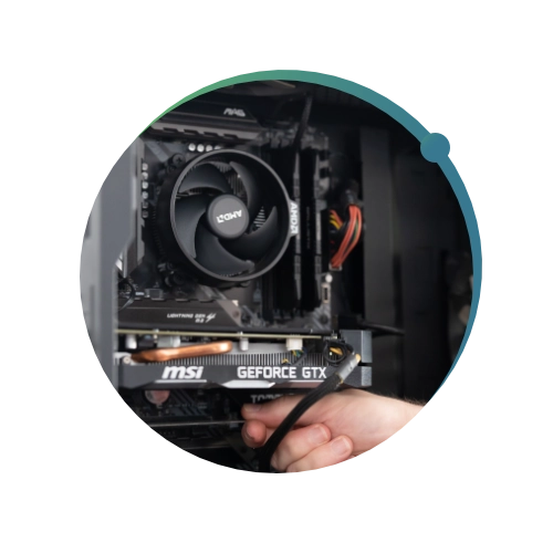 Close up of Conquest wildman team member fixing computer