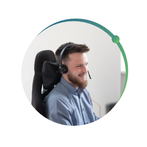 Close up shot of Conquest Wildman team member helping clients with IT Support