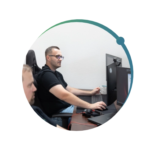 Conquest Wildman team using computers