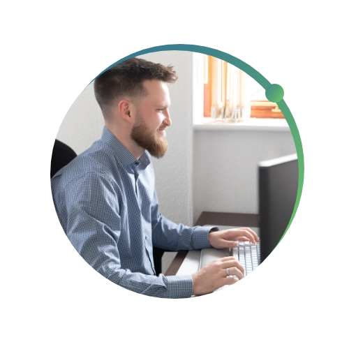 Conquest Wildman team member working at office
