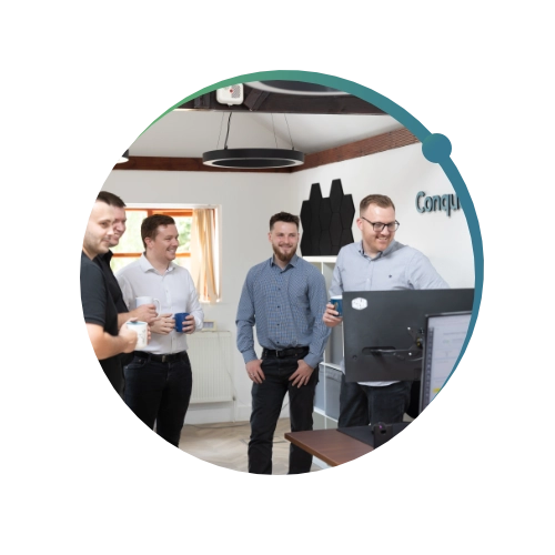 Full Conquest Wildman team standing in the office
